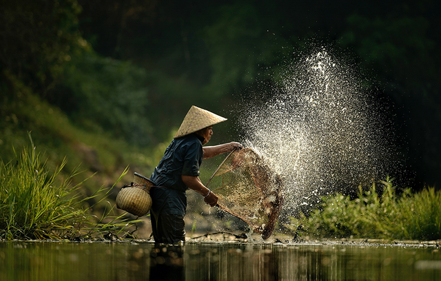Fischer im Mekong Delta | © Adobe Stock